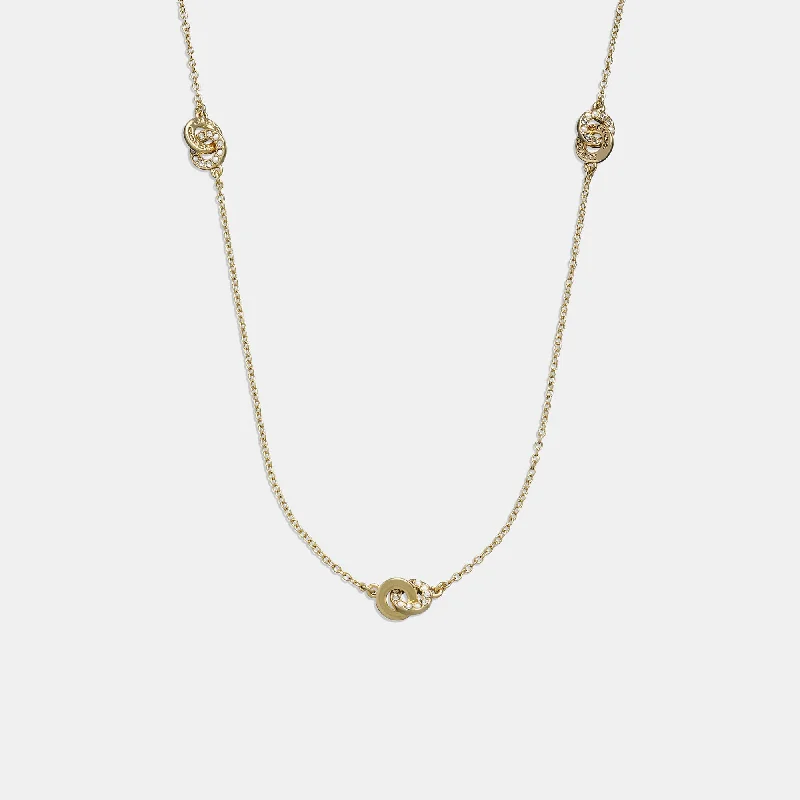 Trending Jewelry Styles Now At Limited-Time Discounts Coach Outlet Interlocking Open Circle Pearl Long Station Necklace Trending Jewelry Styles Now At Limited-Time Discounts Coach Outlet Interlocking Open Circle Pearl Long Station Necklace