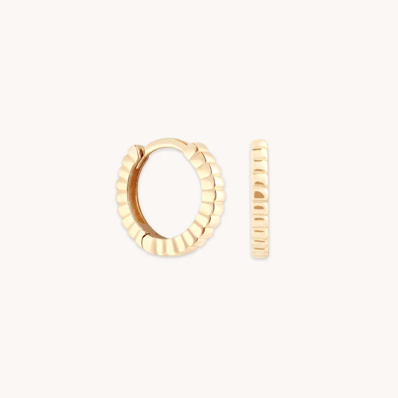 Grab Exquisite Jewelry At The Lowest Prices Ridged Huggies in Solid Gold