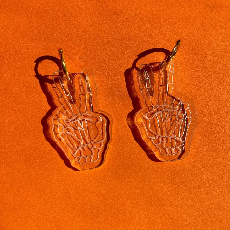 Elevate Your Outfit With Discounted Statement Jewelry Skeleton Peace Sign Hoops