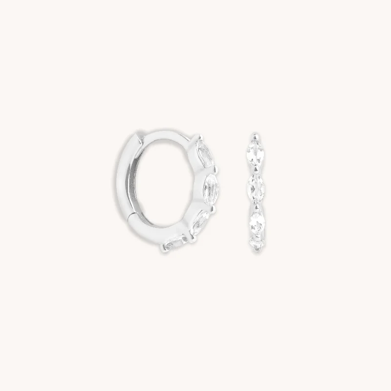Your Perfect Accessory Now At The Best Price White Topaz Marquise Huggies in Solid White Gold Your Perfect Accessory Now At The Best Price White Topaz Marquise Huggies in Solid White Gold