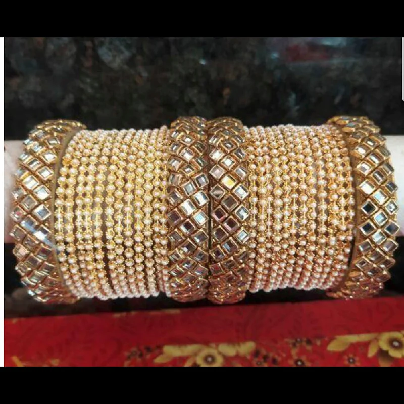 Celebrate Every Occasion With Sparkling Savings Manisha Gold Plated Kundan Stone & Pearl Bangles Set Celebrate Every Occasion With Sparkling Savings Manisha Gold Plated Kundan Stone & Pearl Bangles Set