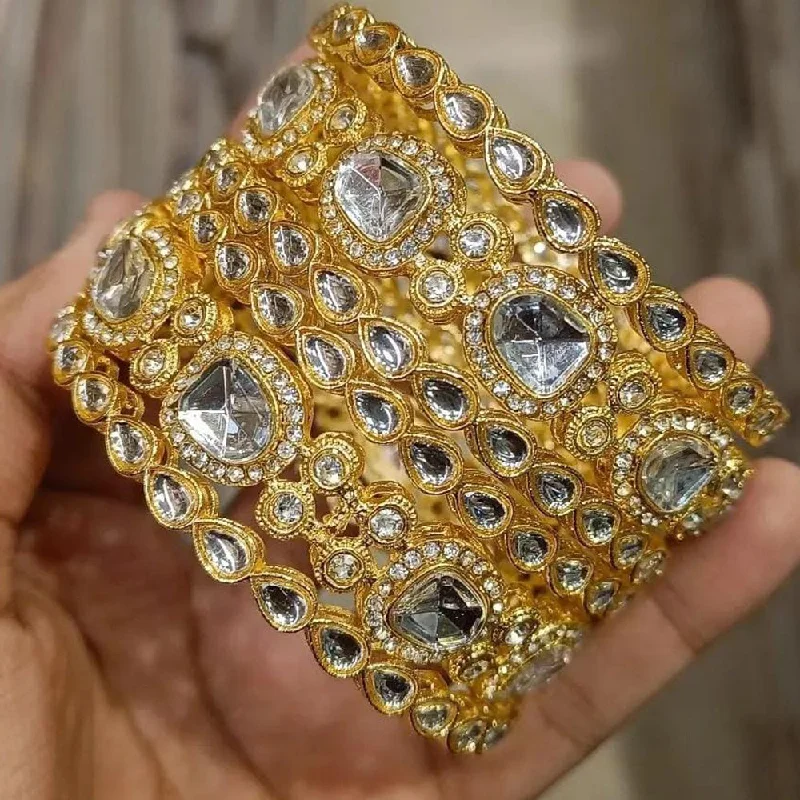 Elevate Your Outfit With Discounted Statement Jewelry Pooja Bangles Gold Plated Crystal Stone Bangles Set Elevate Your Outfit With Discounted Statement Jewelry Pooja Bangles Gold Plated Crystal Stone Bangles Set