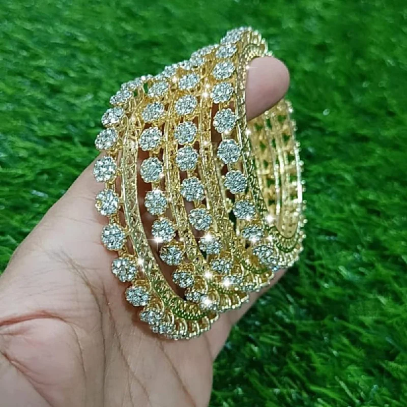 Shop Dazzling Jewelry At The Best Prices Pooja Bangles Gold Plated Pearl Bangle Set Shop Dazzling Jewelry At The Best Prices Pooja Bangles Gold Plated Pearl Bangle Set
