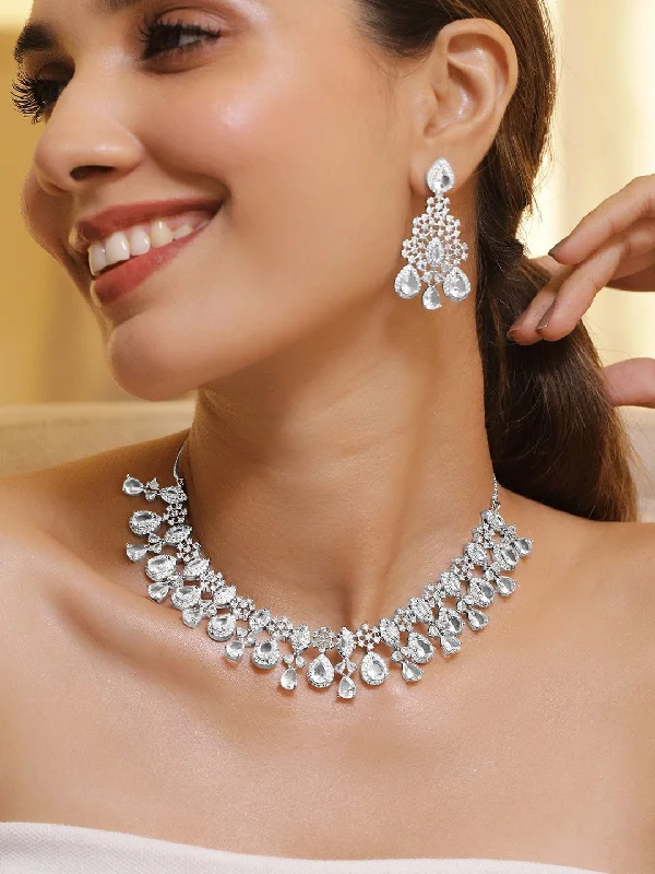 Unique Jewelry Designs Now At Discounted Rates Rhodium-Plated Crystal Cubic Zirconia Studded Necklace Set with Teardrop Earrings Unique Jewelry Designs Now At Discounted Rates Rhodium-Plated Crystal Cubic Zirconia Studded Necklace Set with Teardrop Earrings